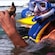 A snorkeler holds up a seashell